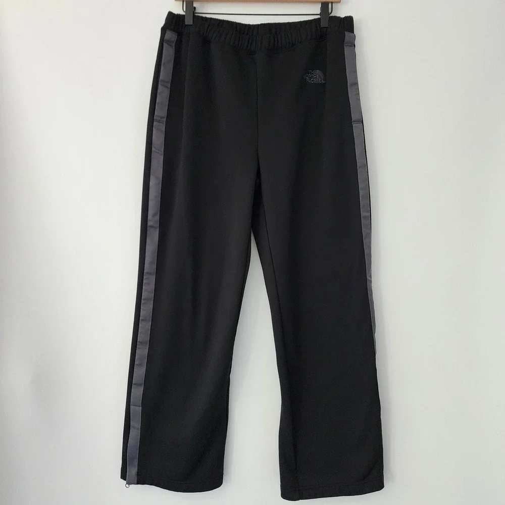 The North Face black fleece lined athletic pull on pants elastic waist‎ size M